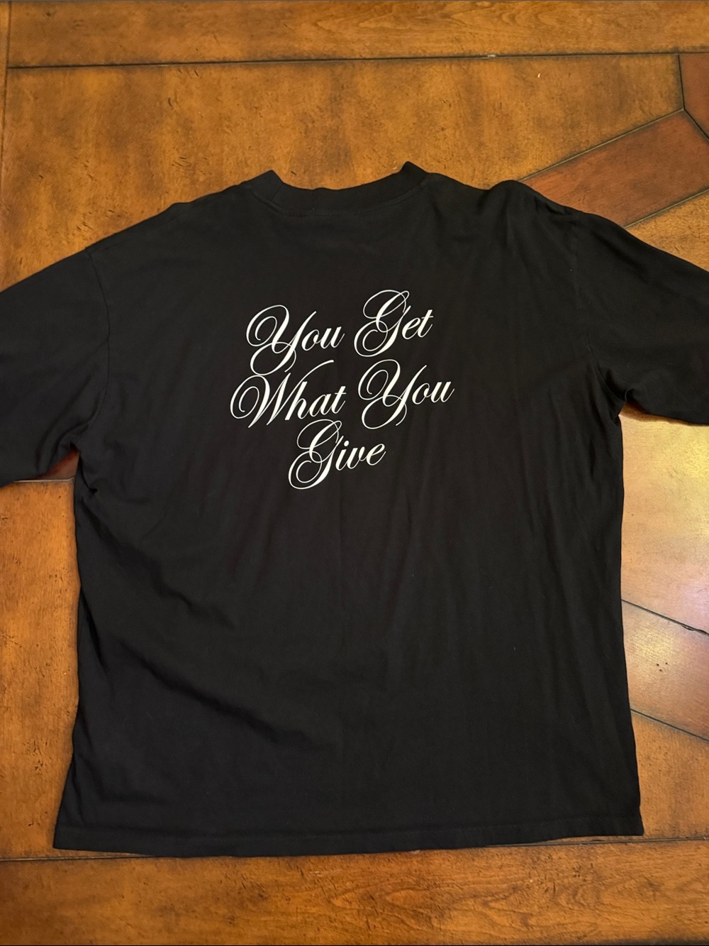 Men's Black Short-Sleeve Graphic Tee - 'You Get What You Give'